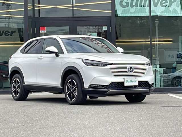 ホンダ ヴェゼル ハイブリッド e:HEV X 鹿児島県 2022(令4)年 3.3万km プラチナホワイトパール 純正ナビ/Bluetooth/TV/AM/FM/車内Wi-Fi/フルセグ/クルーズコントロール/ACC/LKAS/路外逸脱抑制機能/コーナーセンサー/ETC/バックカメラ/横滑り防止装置/純正フロアマット/純正AW16インチ