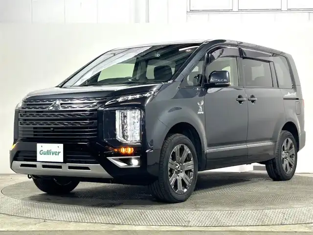 三菱 デリカＤ：５ ジャスパー 大阪府 2023(令5)年 1.1万km グラファイトグレーメタリック/ブラックマイカ 純正10incナビ(フルセグ/DVD再生/Bluetooth) 360カメラ 後席モニター ETC 両側パワースライドドア 衝突軽減 レーダークルコン パワーシート/ヒーター 電動リアゲート ドラレコ