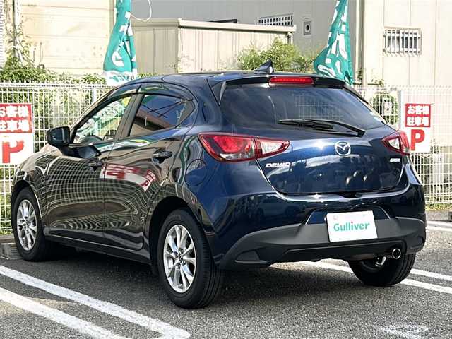 マツダ デミオ 13S ツーリング 大分県 2016(平28)年 3.5万km ディープクリスタルブルーマイカ 登録時走行距離34678km/ワンオーナー/純正マツダコネクトナビ（ナビSD有）/バックカメラ/OP　CD/DVD/フルセグTV機能/OP　セーフティパッケージ/ブラインドスポット/リアクロストラフィックアラート/ハイビームコントロールシステム/車線逸脱警報システム/アクティブドライビングディスプレイ/ETC/前席シートヒーター/シグネチャーランプ付LEDヘッドランプ/オートライト/スマートキー/プッシュスタート/純正フロアマット/ドアバイザー/保証書/取説/スペアキー1本