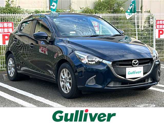 マツダ デミオ 13S ツーリング 大分県 2016(平28)年 3.5万km ディープクリスタルブルーマイカ 登録時走行距離34678km/ワンオーナー/純正マツダコネクトナビ（ナビSD有）/バックカメラ/OP　CD/DVD/フルセグTV機能/OP　セーフティパッケージ/ブラインドスポット/リアクロストラフィックアラート/ハイビームコントロールシステム/車線逸脱警報システム/アクティブドライビングディスプレイ/ETC/前席シートヒーター/シグネチャーランプ付LEDヘッドランプ/オートライト/スマートキー/プッシュスタート/純正フロアマット/ドアバイザー/保証書/取説/スペアキー1本