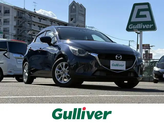マツダ デミオ 13S ツーリング 大分県 2016(平28)年 3.5万km ディープクリスタルブルーマイカ 登録時走行距離34678km/ワンオーナー/純正マツダコネクトナビ（ナビSD有）/バックカメラ/OP　CD/DVD/フルセグTV機能/OP　セーフティパッケージ/ブラインドスポット/リアクロストラフィックアラート/ハイビームコントロールシステム/車線逸脱警報システム/アクティブドライビングディスプレイ/ETC/前席シートヒーター/シグネチャーランプ付LEDヘッドランプ/オートライト/スマートキー/プッシュスタート/純正フロアマット/ドアバイザー/保証書/取説/スペアキー1本