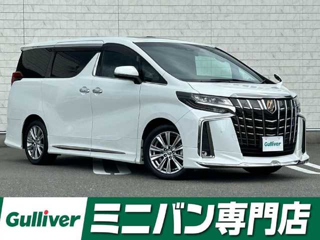 トヨタ アルファード S タイプゴールド 福岡県 2021(令3)年 5.7万km ホワイトパールクリスタルシャイン 純正9型ナビ(フルセグTV/CD/DVD/BT)バックモニター純正フリップダウンモニターWサンルーフ三眼LEDヘッドライトシーケンシャルウィンカーモデリスタエアロトヨタセーフティーセンス前後ドラレコETC2.0電動リアゲート両側パワスラコーナーセンサーレーダークルコンデジタルインナーミラーBSMオットマンUSBポート純正アルミホイール18インチ純正フロアマットスマートキープッシュスタート