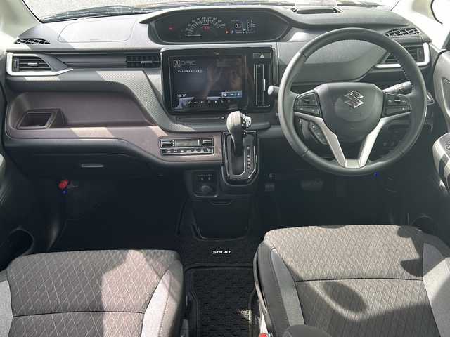 スズキ ソリオ バンディット HV MV 福岡県 2022(令4)年 3.5万km メロウディープレッドパール ・純正ディスプレイオーディオ（ナビ機能付き）/-BT/フルセグ/CD/DVD/FM/AM/USB/・全方位カメラ/・レーダークルーズコントロール/・HUD/・車線逸脱警報/・衝突軽減ブレーキ/・両側パワースライドドア/・前席シートヒーター/・クリアランスソナー/・純正アルミ/・純正フロアマット/・ウィンカーミラー/・ドアバイザー/・アイドリングストップ/・後席ドリンクホルダー/・プッシュスタート/・スマートキー