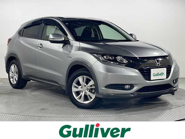 ホンダ ヴェゼル ハイブリッド X ホンダセンシング 広島県 2016(平28)年 3万km ルナシルバーM 純正ナビ　/バックカメラ　/レーダークルーズコントロール　/パドルシフト　/チップアップシート　/レーンキープ　　/オートライト　/衝突軽減システム　/LEDヘッドランプ　/フォグランプ　/Ｂｌｕｅｔｏｏｔｈ　/ＥＴＣ/純正16インチアルミホイール（215/60/R16）/エアバック（運転席/助手席/サイド）/カーテンエアバック