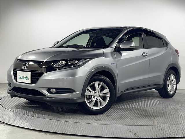 ホンダ ヴェゼル ハイブリッド X ホンダセンシング 広島県 2016(平28)年 3万km ルナシルバーM 純正ナビ　/バックカメラ　/レーダークルーズコントロール　/パドルシフト　/チップアップシート　/レーンキープ　　/オートライト　/衝突軽減システム　/LEDヘッドランプ　/フォグランプ　/Ｂｌｕｅｔｏｏｔｈ　/ＥＴＣ/純正16インチアルミホイール（215/60/R16）/エアバック（運転席/助手席/サイド）/カーテンエアバック