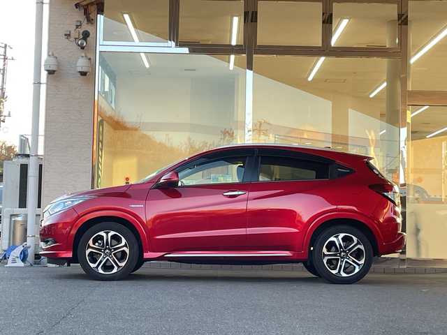 ホンダ ヴェゼル ハイブリッド Z ホンダセンシング 福島県 2018(平30)年 4.9万km プレミアムクリスタルレッドM 純正ＳＤナビ　ハーフレザーシート　バックカメラ　センシング　レーダークルーズコントロール　ＥＴＣ　レーンキープ　シートヒーター　純正アルミホイール　スマートキー　パドルシフト　純正フロアマット