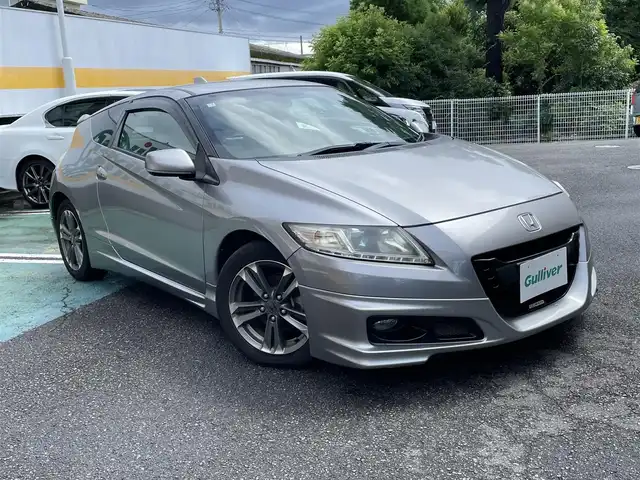 ホンダ ＣＲ－Ｚ α 静岡県 2010(平22)年 8.4万km ストームシルバーメタリック 無限エアロ/純正HDDナビ/ワンセグTV/DVD/CD/バックカメラ/HIDヘッドライト/ビルトインETC/クルーズコントロール/スマートキー/ハーフレザー調シートカバー/パドルシフト/純正16インチAW/保証書/取扱説明書/ナビ取扱説明書