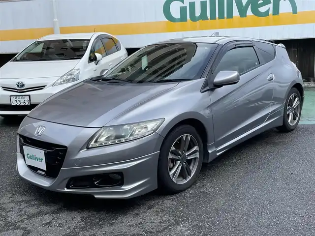 ホンダ ＣＲ－Ｚ α 静岡県 2010(平22)年 8.4万km ストームシルバーメタリック 無限エアロ/純正HDDナビ/ワンセグTV/DVD/CD/バックカメラ/HIDヘッドライト/ビルトインETC/クルーズコントロール/スマートキー/ハーフレザー調シートカバー/パドルシフト/純正16インチAW/保証書/取扱説明書/ナビ取扱説明書