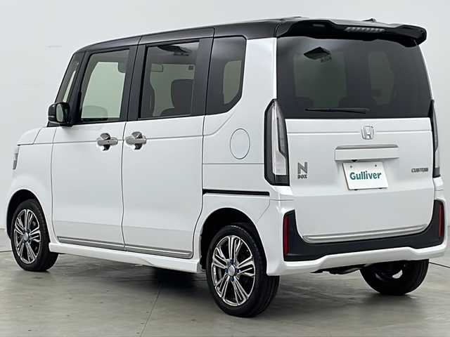 ホンダ Ｎ ＢＯＸ カスタム ターボ コーディネートS 道央・札幌 2024(令6)年 0.6万km プラチナホワイトパール ・ワンオーナー/・純正ナビ&BT&CD&DVD&USB&iPod&AppleCarplay&AndroidAuto&SD/・ホンダセンシング/・衝突軽減ブレーキ/・先行車発進お知らせ機能/・歩行者事故低減ステアリング/・路外逸脱抑制機能/・標識認識機能/・渋滞追従機能付アダプティブクルーズコントロール/・車線維持支援システム/・誤発進抑制機能/・後方誤発進抑制機能/・近距離衝突軽減ブレーキ/・パーキングセンサーシステム/・アイドリングストップシステム /・ビークルスタビリティアシスト/・前席シートヒーター/・レザーシート/・ETC/・パドルシフト/・ステアリングスイッチ/・革巻きステアリング/・電動格納ミラー/・社外フロアマット/・プッシュスタート/・LEDヘッドライト/・オートライト/・ヘッドライトレベライザー/・スマートキー/・スペアキー/・純正AW冬タイヤ積込/・保証書/・取扱説明書