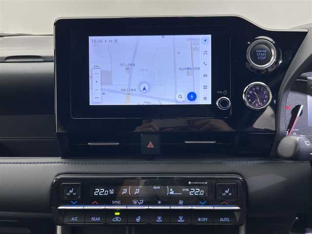 トヨタ ヴォクシー S－Z 愛媛県 2022(令4)年 2.6万km アティチュードブラックマイカ 純正ディスプレイオーディオナビ/(Bluetooth/フルセグ)/バックカメラ/フリップダウンモニター/レーダークルーズコントロール/両側電動スライドドア/衝突被害軽減ブレーキ/快適利便パッケージ/・ナノイーX/・ステアリングヒーター/・シートヒーター/・オットマン/・電動リアゲート/ビルトインETC2.0/オートマチックハイビーム/オートライト/ヘッドライトレベライザー/USB充電/サイドサンシェード/ブレーキホールド/ドアバイザー/ステアリングスイッチ/ECOモード/スペアキー/保証書/取扱説明書