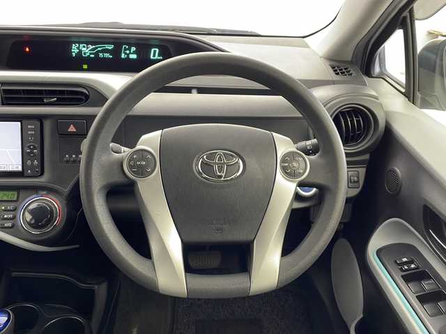 トヨタ アクア S 茨城県 2012(平24)年 7.6万km ライムホワイトパールクリスタルシャイン モデリスタエアロ/純正ナビ/　（CD/DVD/Bluetooth/TV）/バックカメラ/ETC/ステアリングスイッチ/ドライブレコーダー/電動格納ミラー/純正フロアマット/HIDライト/オートライト/プッシュスタート/スマートキー