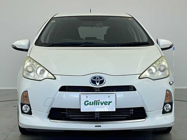 トヨタ アクア S 茨城県 2012(平24)年 7.6万km ライムホワイトパールクリスタルシャイン モデリスタエアロ/純正ナビ/　（CD/DVD/Bluetooth/TV）/バックカメラ/ETC/ステアリングスイッチ/ドライブレコーダー/電動格納ミラー/純正フロアマット/HIDライト/オートライト/プッシュスタート/スマートキー