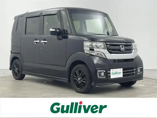 ホンダ Ｎ ＢＯＸ カスタム SSブラックSパッケージ 大分県 2017(平29)年 8.8万km クリスタルブラックパール 純正ナビ　型式：VXM-174VFXi/【フルセグTV、DVD再生可、BT対応】/ステアリングスイッチ/バックカメラ/両側電動スライドドア/ビルトインETC/前席シートヒーター/革調シートカバー/アイドリングストップ/横滑り防止装置/電動格納ミラー(オートリトラ機能付)/純正フロアマット/オートライト/HIDヘッドライト/LEDフォグ/純正14インチアルミホイール