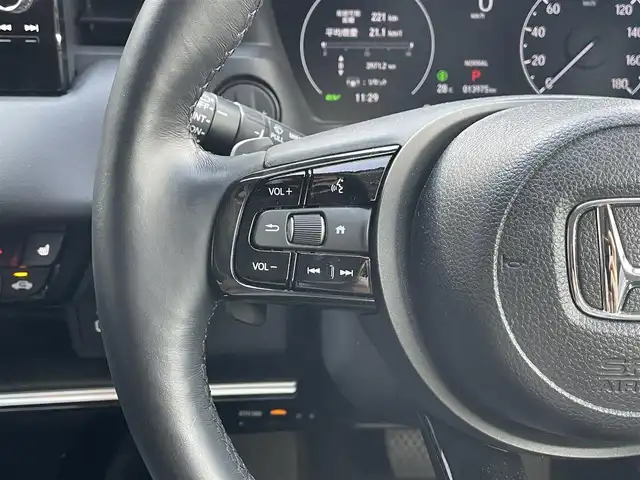 ホンダ ヴェゼル ハイブリッド e:HEV Z 滋賀県 2023(令5)年 1.4万km ミッドナイトブルービームM 純正9型ナビ/・Bluetooth/USB/フルセグ/バックカメラ/追従クルーズコントロール/パワーリアゲート/LEDライト/ハーフレザーシート/シートヒーター/ステアリングヒーター/前後ソナー/純正１８AW/オートライト/オートハイビーム/電子パーキング