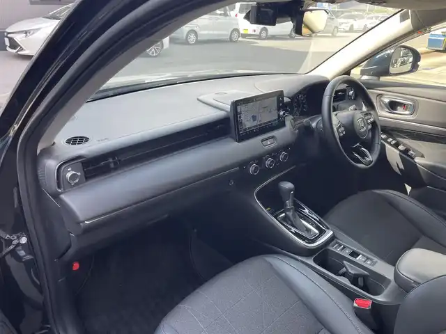 ホンダ ヴェゼル ハイブリッド e:HEV Z 滋賀県 2023(令5)年 1.4万km ミッドナイトブルービームM 純正9型ナビ/・Bluetooth/USB/フルセグ/バックカメラ/追従クルーズコントロール/パワーリアゲート/LEDライト/ハーフレザーシート/シートヒーター/ステアリングヒーター/前後ソナー/純正１８AW/オートライト/オートハイビーム/電子パーキング