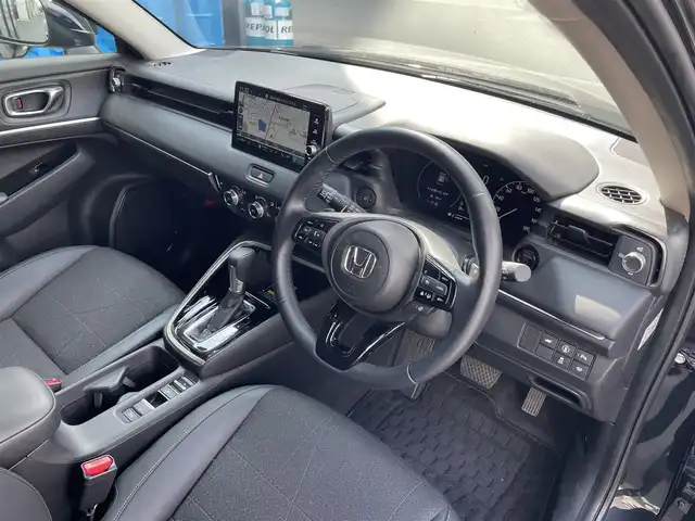 ホンダ ヴェゼル ハイブリッド e:HEV Z 滋賀県 2023(令5)年 1.4万km ミッドナイトブルービームM 純正9型ナビ/・Bluetooth/USB/フルセグ/バックカメラ/追従クルーズコントロール/パワーリアゲート/LEDライト/ハーフレザーシート/シートヒーター/ステアリングヒーター/前後ソナー/純正１８AW/オートライト/オートハイビーム/電子パーキング