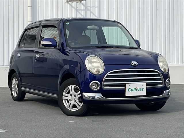 ダイハツ ミラ ジーノ プレミアムX 三重県 2006(平18)年 12.9万km プレシャスブルーマイカメタリック 社外オーディオ/ＣＤ　ＭＤ再生/ＥＴＣ/ＭＯＭＯステアリング/電動格納ミラー/パワーウィンドウ/オートエアコン/ハーフレザーシート/純正ＡＷ/純正フロアマット/禁煙車