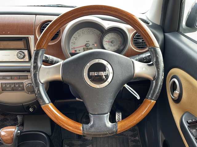 ダイハツ ミラ ジーノ プレミアムX 三重県 2006(平18)年 12.9万km プレシャスブルーマイカメタリック 社外オーディオ/ＣＤ　ＭＤ再生/ＥＴＣ/ＭＯＭＯステアリング/電動格納ミラー/パワーウィンドウ/オートエアコン/ハーフレザーシート/純正ＡＷ/純正フロアマット/禁煙車