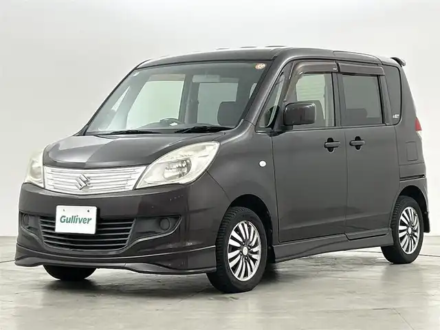 スズキ ソリオ X 福岡県 2012(平24)年 10.9万km アーバンブラウンパールメタリック 社外ナビ（Ｂｌｕｅｔｏｏｔｈ，ワンセグＴＶ）　/エンジンプッシュスタート　/横滑り防止装置　/アイドリングストップ　/片側電動スライドドア　/フルオートエアコン　/純正フロアマット　/純正１４インチアルミホイール