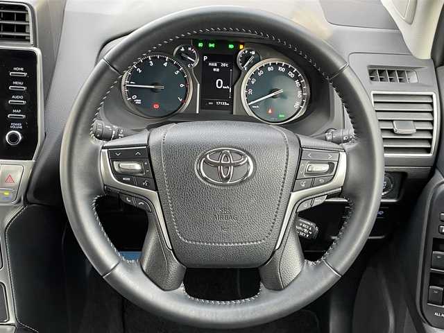 トヨタ ランドクルーザー プラド TX Lパッケージ マットブラED 愛知県 2022(令4)年 1.8万km アティチュードブラックマイカ 純正ディスプレイナビ　フルセグＴＶ　全方位カメラ　ムーンルーフ　黒革　シートヒーター　７人乗　ルーフレール　ＢＳＭ　バックカメラ　セーフティセンス　衝突軽減　追従クルコン　ＬＥＤオートライト　禁煙車