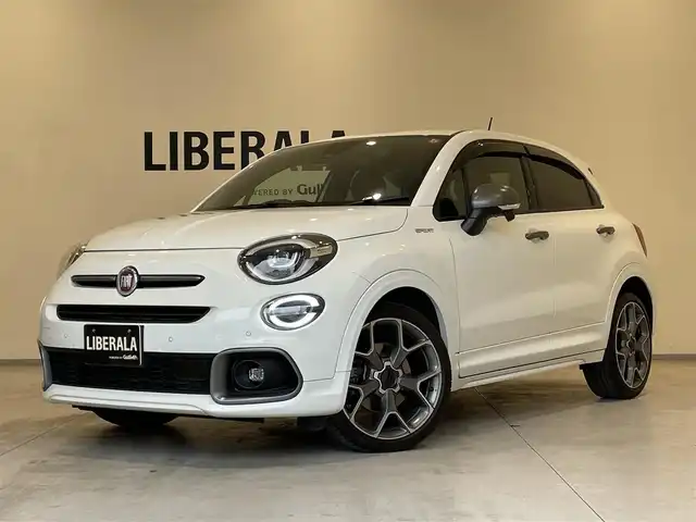 フィアット ５００Ｘ スポーツ 熊本県 2020(令2)年 3.2万km 白 ・ワンオーナー/・スマートキー/・プッシュスタート/・全面衝突警報/・アクティブブレーキ/・レーンキープエイド/・パークアシスト/・前後パーキングセンサー/・ブラインドスポットモニター/・クルーズコントロール(追従式)/・黒革シート/・前席パワーシート/・前席シートヒーター /・社外メモリナビ/　【DVD・Bluetooth・USB・SD・MSV】/・フルセグTV/・バックカメラ/・ETC/・ドライブレコーダー(前後録画)/・LEDヘッドランプ/・LEDフォグランプ/・純正マット/・純正バイザー/・保証書/取説
