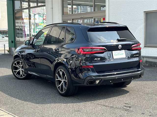 ＢＭＷ ＢＭＷ Ｘ５ xDrive 40d Mスポーツ 愛知県 2023(令5)年 1.4万km カーボンブラックM /正規ディーラー車//禁煙//ワンオーナー//D整備記録簿R6.7//harman/kardon//アクスルレベルコントロール//21インチMライトアロイYスポークホイール/RFT//12.3インチナビ/ライブコックピット//フルセグ/BT/USB/CarPlay/Spotify//ジェスチャーコントロール//パノラマビューM//360°全周囲＆リアカメラドラレコ//ミラー一体型ETC//ワイヤレスチャージング//白革シート//パワーシート/ランバーサポート/全席シートヒーター//ドライビングアシストプロフェッショナル//衝突回避被害軽減ブレーキ//渋滞時ハンズオフアシスト//ステアリングサポート・アシスト//LCA/LDW/ACC//クロスロードウォーニング//クロストラフィックウォーニング//HUD//パーキングアシストプラス//PDC//ルーフレール//HDC//DTC//パドルシフト/MTモード付きAT//スピードLIM//アンビエントライト//アダクティブLEDヘッドライト/ハイビームアシスト//コーナリングライト//リアフォグランプ//電動ハンズフリーテールゲート/コンフォートアクセス//ソフトクローズドア//プッシュスタート/デジタルキー/スペアスマートキー//オートリトラウィンカーミラー//保証書/取扱説明書