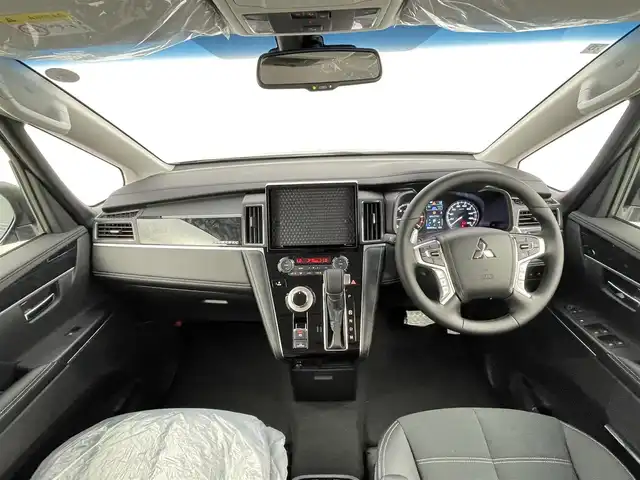 三菱 デリカＤ：５ シャモニー 千葉県 2025(令7)年 0.1千km ブラックダイヤモンド CHAMONIX (8人)　4WD　オリジナルナビ取付パッケージ＋リアモニター取付パッケージ(25/300)　ステップレス　（8人）/禁煙車/4WD/セーフティ・サポートカーS ワイド/・衝突被害軽減ブレーキシステム/・誤発進抑制機能/・車線逸脱警報システム/・オートマチックハイビーム/両側パワースライドドア/レーダークルーズコントロール/LEDオートライト/ハーフレザーシート/純正18インチアルミホイール/パドルシフト/オートエアコン/アイドリングストップ/プッシュスタート
