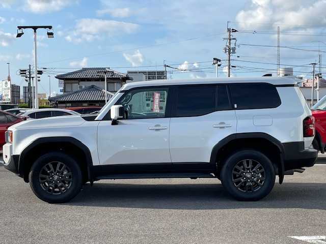 トヨタ ランドクルーザー ２５０ VX 長崎県 2024(令6)年 1.8万km プラチナホワイトパールマイカ 純正メーカーナビ/BT/Mira cast/USB/HDMI/フルセグTV/パノラマビューモニター/サンルーフ/黒本革シート/D席パワーシート/前席シートヒーター/前席エアーシート/トヨタセーフティセンス/レーダークルーズコントロール/ステアリングスイッチ/デジタルインナーミラー/ステアリングヒーター/パワーバックドア/LEDヘッドライト/オートマチックハイビーム/ビルトインETC