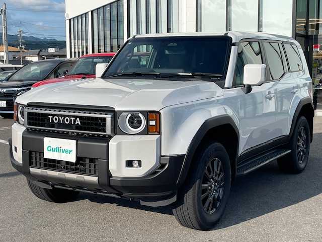トヨタ ランドクルーザー ２５０ VX 長崎県 2024(令6)年 1.8万km プラチナホワイトパールマイカ 純正メーカーナビ/BT/Mira cast/USB/HDMI/フルセグTV/パノラマビューモニター/サンルーフ/黒本革シート/D席パワーシート/前席シートヒーター/前席エアーシート/トヨタセーフティセンス/レーダークルーズコントロール/ステアリングスイッチ/デジタルインナーミラー/ステアリングヒーター/パワーバックドア/LEDヘッドライト/オートマチックハイビーム/ビルトインETC