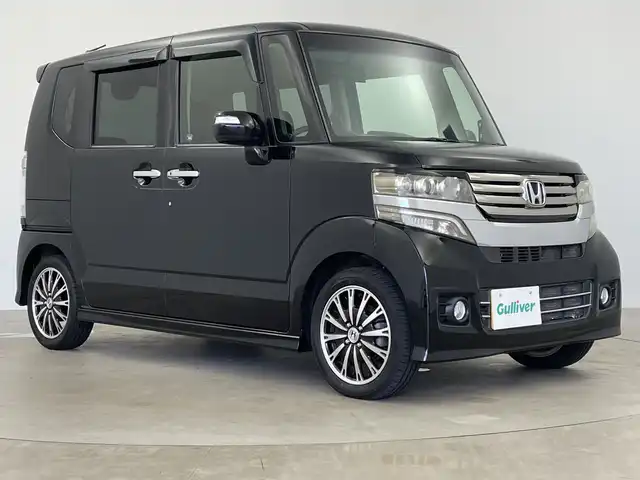 ホンダ Ｎ ＢＯＸ カスタム G ターボパッケージ 鹿児島県 2013(平25)年 9.2万km クリスタルブラックパール ワンオーナー/社外8インチナビ/(AM/FM/CD/DVD/Bluetooth)/フルセグテレビ/バックカメラ/両側パワースライドドア/革調シートカバー/パドルシフト /クルーズコントロール/ステアロングリモコン/オートライト/ETC/純正AW15インチ/電格ミラー