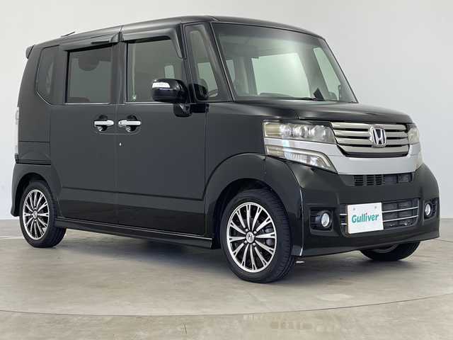 ホンダ Ｎ ＢＯＸ カスタム G ターボパッケージ 鹿児島県 2013(平25)年 9.2万km クリスタルブラックパール ワンオーナー/社外8インチナビ/(AM/FM/CD/DVD/Bluetooth)/フルセグテレビ/バックカメラ/両側パワースライドドア/革調シートカバー/パドルシフト /クルーズコントロール/ステアロングリモコン/オートライト/ETC/純正AW15インチ/電格ミラー