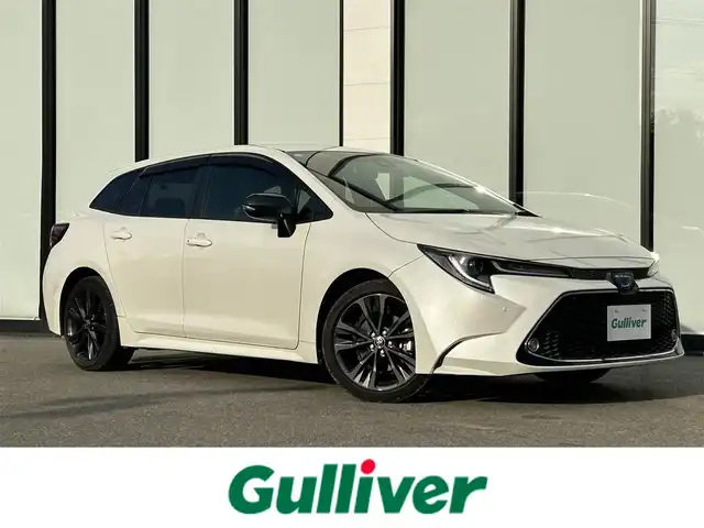 トヨタ カローラツーリング ハイブリッド ダブルバイビー 大阪府 2021(令3)年 3.3万km ホワイトパールクリスタルシャイン トヨタセーフティセンス/・アダプティクブクルーズコントロール/・プリクラッシュセーフティー/・レーントレーシングアシスト/・クリアランスソナー/・パーキングサポートブレーキー/・オートマチックハイビーム/・ロードサインアシスト/純正9インチナビ/・Bluetooth/Miracast/ラジオ/主要装備/・バックカメラ/・横滑り防止装置/・オートホールド/・LEDヘッドライト/・ヘッドライトレベライザー/・フォグランプ/・SOSコール/・手動防眩ルームミラー/・ドライブレコーダー/・ETC