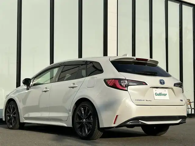 トヨタ カローラツーリング ハイブリッド ダブルバイビー 大阪府 2021(令3)年 3.3万km ホワイトパールクリスタルシャイン トヨタセーフティセンス/・アダプティクブクルーズコントロール/・プリクラッシュセーフティー/・レーントレーシングアシスト/・クリアランスソナー/・パーキングサポートブレーキー/・オートマチックハイビーム/・ロードサインアシスト/純正9インチナビ/・Bluetooth/Miracast/ラジオ/主要装備/・バックカメラ/・横滑り防止装置/・オートホールド/・LEDヘッドライト/・ヘッドライトレベライザー/・フォグランプ/・SOSコール/・手動防眩ルームミラー/・ドライブレコーダー/・ETC