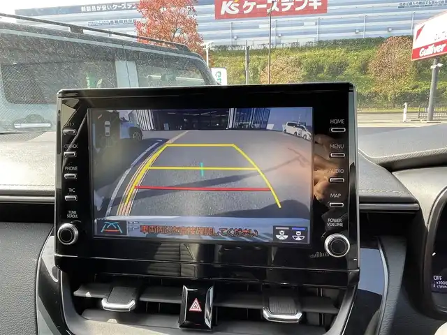 トヨタ カローラツーリング ハイブリッド ダブルバイビー 大阪府 2021(令3)年 3.3万km ホワイトパールクリスタルシャイン トヨタセーフティセンス/・アダプティクブクルーズコントロール/・プリクラッシュセーフティー/・レーントレーシングアシスト/・クリアランスソナー/・パーキングサポートブレーキー/・オートマチックハイビーム/・ロードサインアシスト/純正9インチナビ/・Bluetooth/Miracast/ラジオ/主要装備/・バックカメラ/・横滑り防止装置/・オートホールド/・LEDヘッドライト/・ヘッドライトレベライザー/・フォグランプ/・SOSコール/・手動防眩ルームミラー/・ドライブレコーダー/・ETC