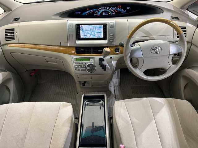 トヨタ エスティマ G 愛媛県 2008(平20)年 4.8万km シルキーゴールドマイカメタリック 純正ナビ／後席モニター／両側電動スライドドア／バックカメラ／クルーズコントロール／ワンセグＴＶ／スマートキー／パワーシート／純正フロアマット／取扱説明書／オートライト／電動格納ミラー／禁煙