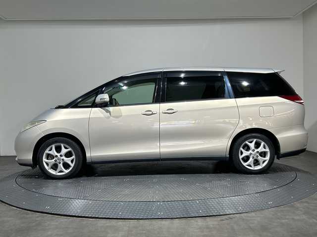 トヨタ エスティマ G 愛媛県 2008(平20)年 4.8万km シルキーゴールドマイカメタリック 純正ナビ／後席モニター／両側電動スライドドア／バックカメラ／クルーズコントロール／ワンセグＴＶ／スマートキー／パワーシート／純正フロアマット／取扱説明書／オートライト／電動格納ミラー／禁煙