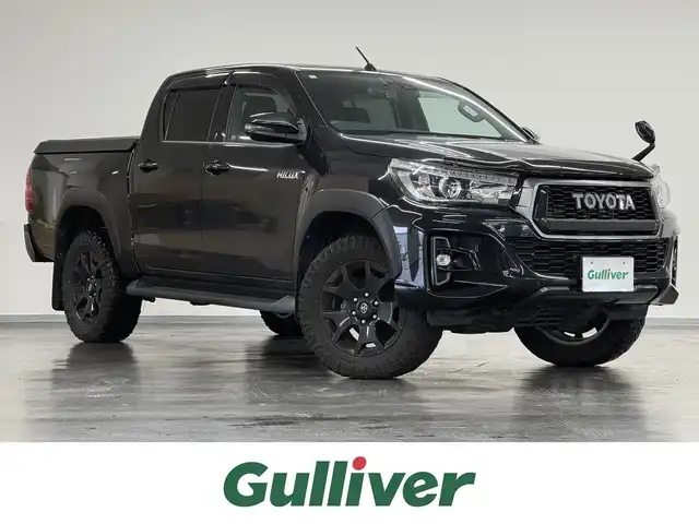 トヨタ ハイラックス Z ブラックラリーエディション 三重県 2019(令1)年 9.9万km アティチュードブラックマイカ 2.4L ディーゼルターボ/パートタイム4WD/MTモード付フロア6AT/純正 7インチナビ NSZT-W68T/（AM/FM/CD/DVD/TV/SD/SDREC/Bluetooth）/バックガイドモニター/ドライブレコーダー 前後/ETC/Toyota Safety Sense/・プリクラッシュセーフティ［PCS］/・レーンディパーチャーアラート［LDA］/・ダウンヒルアシストコントロール［DAC］/・ヒルスタートアシストコントロール［HAC］/・EBD（電子制動力配分制御）付ABS＆ブレーキアシスト/・VSC＆TRC/・緊急ブレーキシグナル/装備/・豪州トヨタ純正バグガード/・ハードトノカバー（施錠機能・ダンパー付）/・クルーズコントロール/・オートエアコン/・プッシュスタート/・オートライト/・フロント＆リヤフォグランプ/・ブラックラリーED専用 18inAW（ブラック塗装）