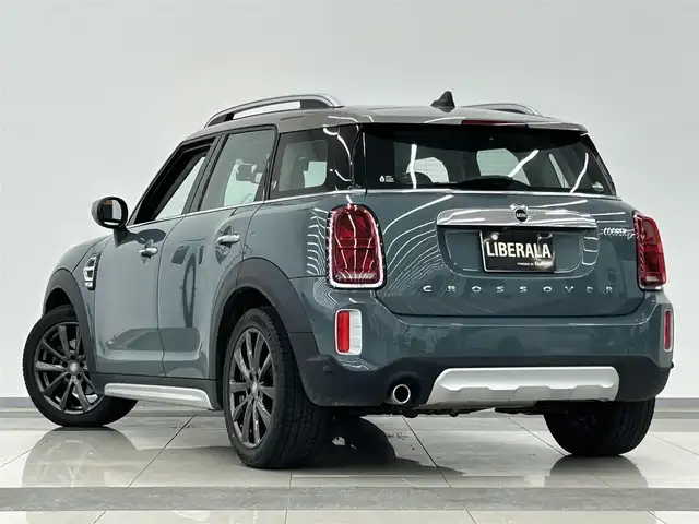 ＭＩＮＩ ＢＭＷ ミニ クロスオーバー クーパー D オール4 岡山県 2021(令3)年 1.3万km セージグリーンメタリック 純ナビ/HUD/シートヒータ/前PWシート/アンビエントライト/ACC/ドラレコ/ミラー一体ETC/本革レザー/マルチディスプレイメータ/PWテールゲート/社外AW/ユニオンジャックテール