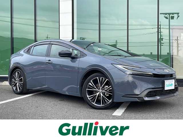 トヨタ プリウス G 福岡県 2023(令5)年 0.4万km グレー 純正メモリナビ／Ｂｌｕｅｔｏｏｔｈ／フルセグＴＶ／バックカメラ／ＥＴＣ／ワンオーナー／前後ドラレコ／ステアリングリモコン／オートクルーズコントロール／ＬＥＤヘッドライト／スペアキー／純正アルミホイール