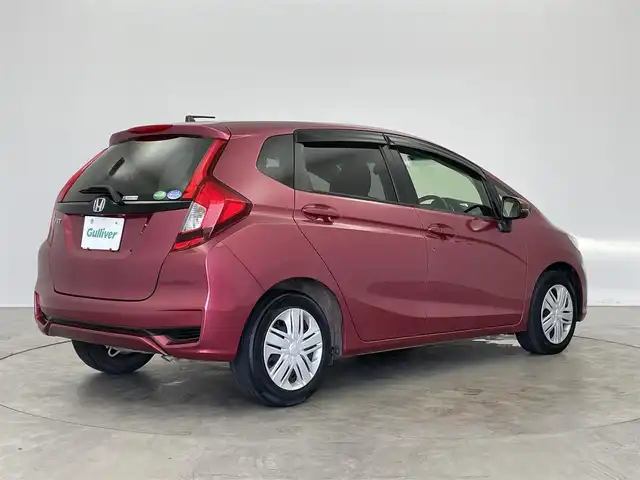 ホンダ フィット 13G L ホンダセンシング 埼玉県 2018(平30)年 6.1万km ルージュアメジストM 純正ナビ　バックカメラ　アダプティブクルーズコントロール　ＬＥＤヘッドライト　ＥＴＣ　オートライト　ホンダセンシング　ステアリングスイッチ　プッシュスタート　スマートキー　地デジフルセグＴＶ