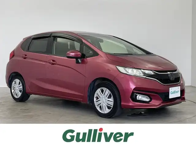 ホンダ フィット 13G L ホンダセンシング 埼玉県 2018(平30)年 6.1万km ルージュアメジストM 純正ナビ　バックカメラ　アダプティブクルーズコントロール　ＬＥＤヘッドライト　ＥＴＣ　オートライト　ホンダセンシング　ステアリングスイッチ　プッシュスタート　スマートキー　地デジフルセグＴＶ