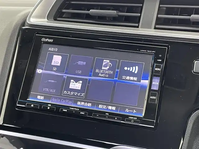 ホンダ フィット 13G L ホンダセンシング 埼玉県 2018(平30)年 6.1万km ルージュアメジストM 純正ナビ　バックカメラ　アダプティブクルーズコントロール　ＬＥＤヘッドライト　ＥＴＣ　オートライト　ホンダセンシング　ステアリングスイッチ　プッシュスタート　スマートキー　地デジフルセグＴＶ