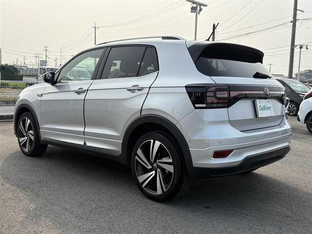 フォルクスワーゲン ＶＷ Ｔ－クロス TSI Rライン 徳島県 2023(令5)年 1.4万km シルバー 純正ナビ/ハーフレザーシート/置くだけ充電/前後ドライブレコーダー/ＨＩＤヘッドライト/ＥＴＣ/タイプＣ充電/ＭＴモード付ＡＴ/ルーフレール/パーキングアシスト機能/プッシュスタート