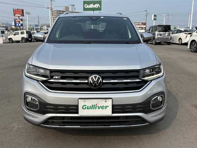フォルクスワーゲン ＶＷ Ｔ－クロス TSI Rライン 徳島県 2023(令5)年 1.4万km シルバー 純正ナビ/ハーフレザーシート/置くだけ充電/前後ドライブレコーダー/ＨＩＤヘッドライト/ＥＴＣ/タイプＣ充電/ＭＴモード付ＡＴ/ルーフレール/パーキングアシスト機能/プッシュスタート