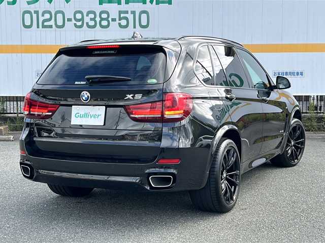 ＢＭＷ Ｘ５ ブラックアウト 山口県 2017(平29)年 2.6万km サファイアブラックP サンルーフ/純正ナビ/DVD/CD/AUX/フルセグTV/バックカメラ/ハーマンカードンオーディオ/黒レザーシート/前席パワーシート/全席シートヒーター/純正LEDヘッドライト/純正フォグランプ/オートライト/純正20インチアルミホイール/革巻きステアリング/ステアリングスイッチ/パドルシフト/クルーズコントロール/パワーバックドア/衝突被害軽減ブレーキ/LKA/横滑り防止/DAC/オートパーキングホールド/コーナーセンサー/スマートキー/ミラー一体型ETC/前後タイプドライブレコーダー/フロアマット/電動格納ウインカードアミラー