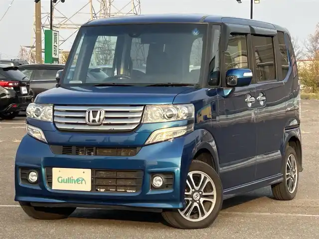 ホンダ Ｎ ＢＯＸ カスタム G 道央・札幌 2014(平26)年 6.7万km プレミアムダイナミックブルーパール ４WD/社外SDナビ/CD/DVD/BT/フルセグ/シティブレーキアクティブシステム/横滑り防止装置/バックカメラ/ETC/ECONモード/片側パワースライドドア/ステアリングリモコン/プッシュスタート/スマートキー/HIDヘッドライト/オートライト/フォグランプ/電動格納ミラー/純正フロアマット/ドアバイザー/スペアキー/社外エンジンスターター