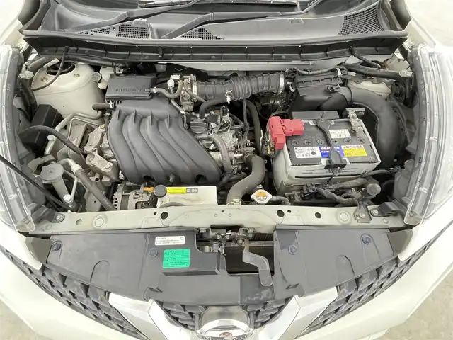日産 ジューク 15RX 千葉県 2015(平27)年 11.3万km ブリリアントホワイトパール 純正7インチSDナビ/CD DVD AUX BT フルセグ/バックカメラ/横滑り防止装置/オートライト/社外16インチアルミホイール/ドアバイザー/ウィンカーミラー/アイドリングストップ/純正フロアマット/プッシュスタート/スマートキー/ETC