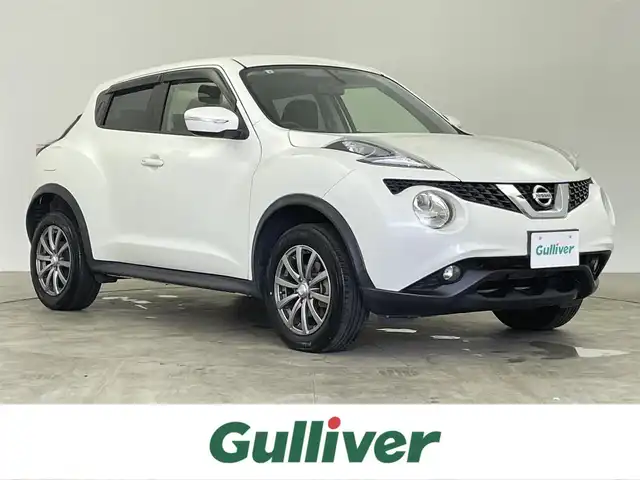 日産 ジューク 15RX 千葉県 2015(平27)年 11.3万km ブリリアントホワイトパール 純正7インチSDナビ/CD DVD AUX BT フルセグ/バックカメラ/横滑り防止装置/オートライト/社外16インチアルミホイール/ドアバイザー/ウィンカーミラー/アイドリングストップ/純正フロアマット/プッシュスタート/スマートキー/ETC