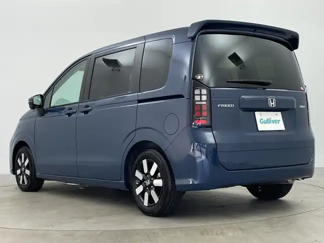 ホンダ フリード ハイブリット e:HEV AIR EX 鹿児島県 2024(令6)年 0.2万km 青 登録済未使用車/ホンダセンシング/・衝突軽減ブレーキ（CMBS）/・先行車発進お知らせ機能/・歩行者事故低減ステアリング/・路外逸脱抑制機能/・標識認識機能/・渋滞追従機能付アダプティブクルーズコントロール/・車線維持支援システム（LKAS）/・トラフィックジャムアシスト（渋滞運転支援機能）/・ブラインドスポットインフォメーション/・誤発進抑制機能/・後方誤発進抑制機能/・近距離衝突軽減ブレーキ/・急アクセル抑制機能/・パーキングセンサーシステム/・オートハイビーム/純正9インチメモリナビ/（フルセグ/Bluetooth/USB)/バックカメラ/両側パワースライドドア/スマートキー/プッシュスタート/リアクーラー/前席シートヒーター/ステアリングリモコン/電子パーキング/オートホールド/本革巻ステアリングホイール/360°スーパーUV・IRカット パッケージ/ロールサンシェード（スライドドア両側）/USBチャージャー