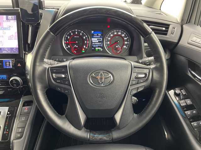 トヨタ ヴェルファイア Z Gエディション 愛知県 2019(令1)年 5.1万km ホワイトパールクリスタルシャイン ＡＬＰＩＮＥ９インチナビ/ALPINE12インチフリップダウンモニター/両側パワースライドドア/ＴＲＤエアロ（R/S/R）/デジタルインナーミラー/パワーシート/シートヒーター/エアーシート/追従クルコン/前後ドライブレコーダー/衝突軽減/レーンキープ/クリアランスソナー/ブラインドスポットモニター/ALPINEスピーカー/TRDパフォーマンスダンパーセット/TRDメンバーブレースセット/TRDドアスタビライザーセット/カーヴエV3車高調/ETC/オートマチックハイビーム/LEDヘッドライト/純正フロアマット/純正アルミホイール